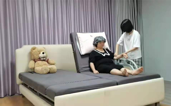 雙旋轉(zhuǎn)電動護理床
